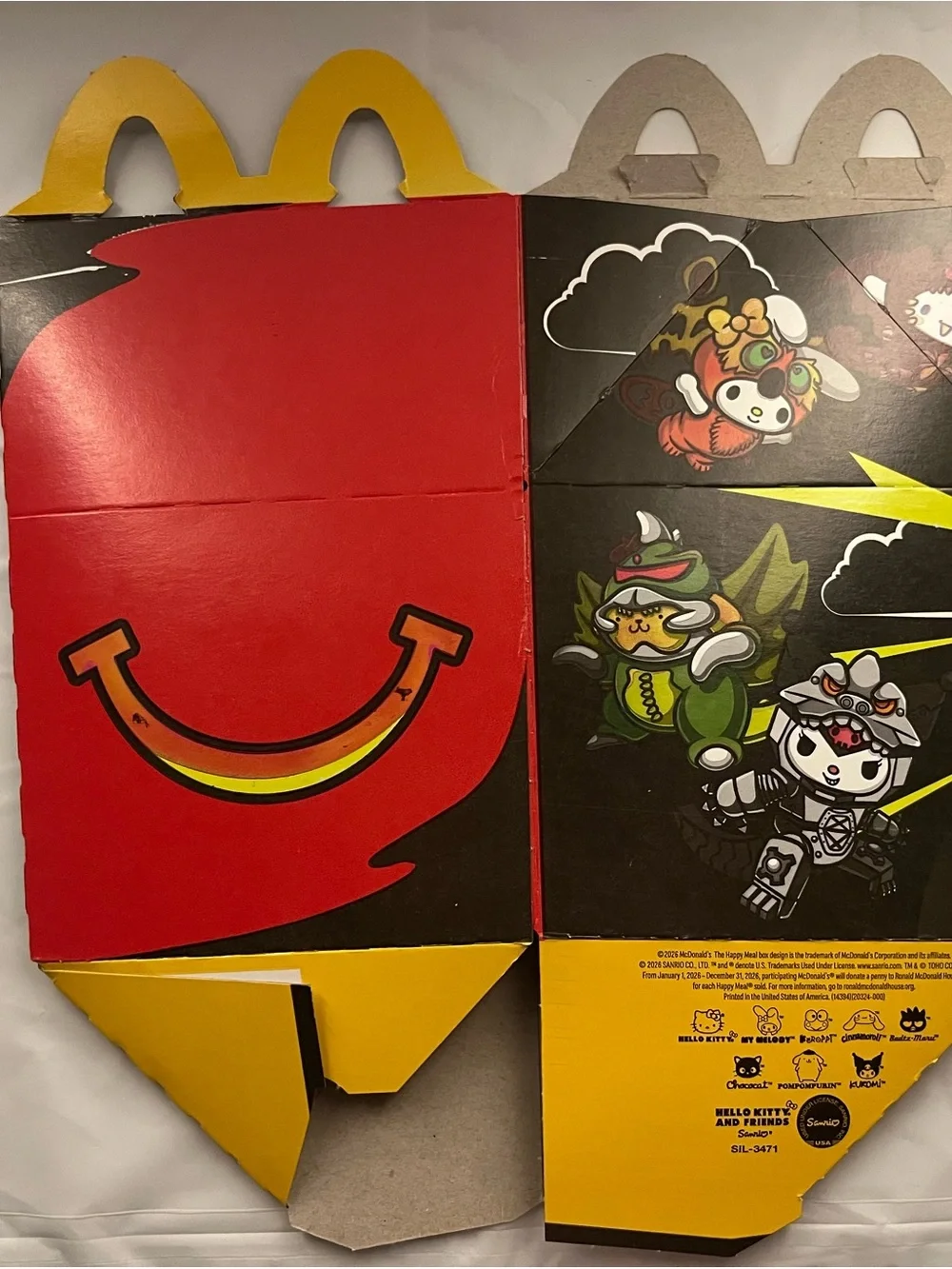 Hello Kitty Godzilla McDonald’s Happy Meal figure and box
